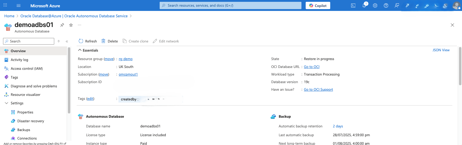 This screenshot shows the automatic restore of an Autonomous Database.